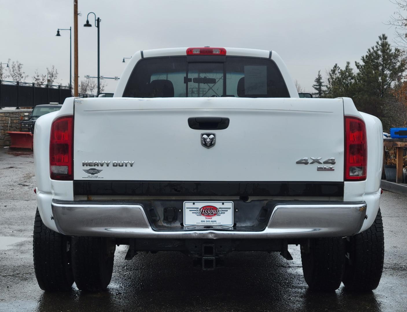 2005 White /Black Dodge Ram 3500 SLT (3D7LS38C85G) with an 5.9L I6 24V Cummins engine, 6 Speed Manual transmission, located at 450 N Russell, Missoula, MT, 59801, (406) 543-6600, 46.874496, -114.017433 - 4 Wheel Drive. One Ton Dually. Long Box. 6 Speed Manual Transmission. Has a lot of miles but runs amazingly. Air Cruise. Tilt. Power Windows and Locks. Power Drivers Seat. AM FM CD XM. 1 Owner. Clean Carfax. There is no financing options on this vehicle. - Photo#6